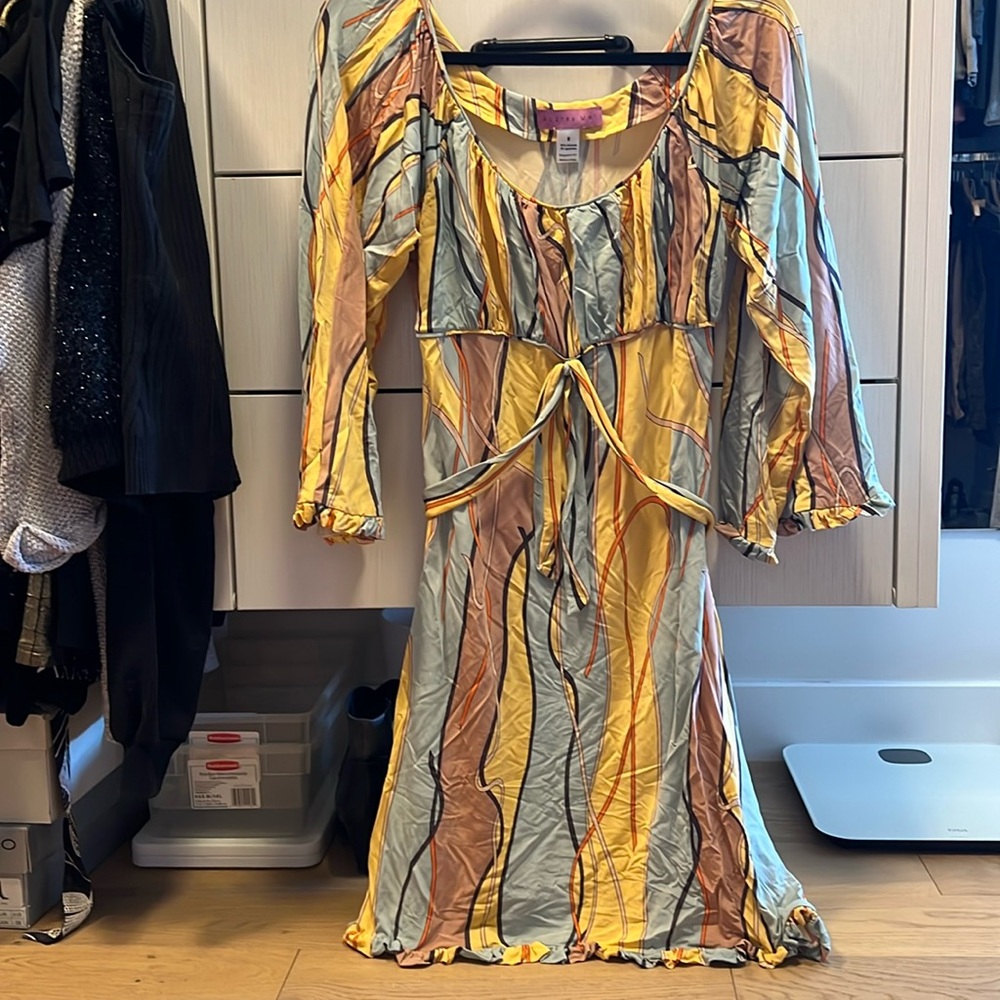 Audrey Mai 70’s boho inspired dress with scoop neck and waist ties